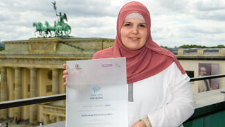 Eine Uni – ein Buch: Übergabe der Urkunden am 27. Juli 2022 in Berlin (Foto: Peter Himsel)